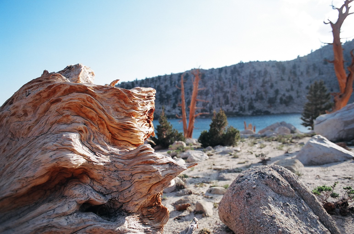 Towering granite mountains near a small cirque