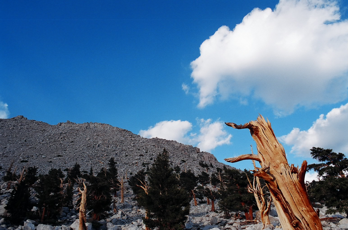 Towering granite mountains near a small cirque
