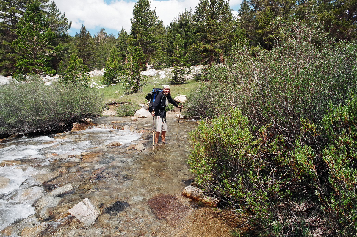 Fording a stream in the Sierras.