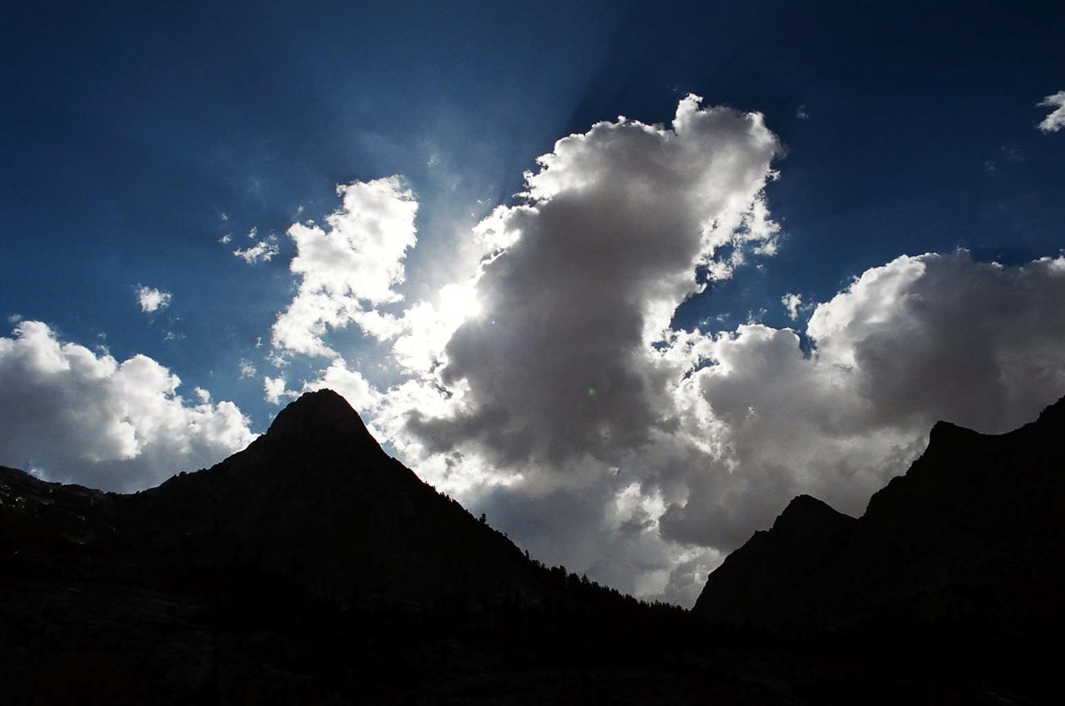 Mountains silhouetted against the sky.