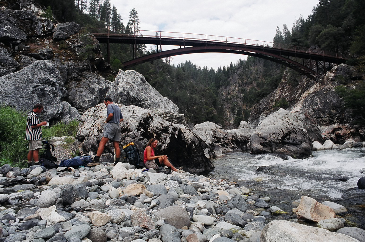 Washing up in a river.