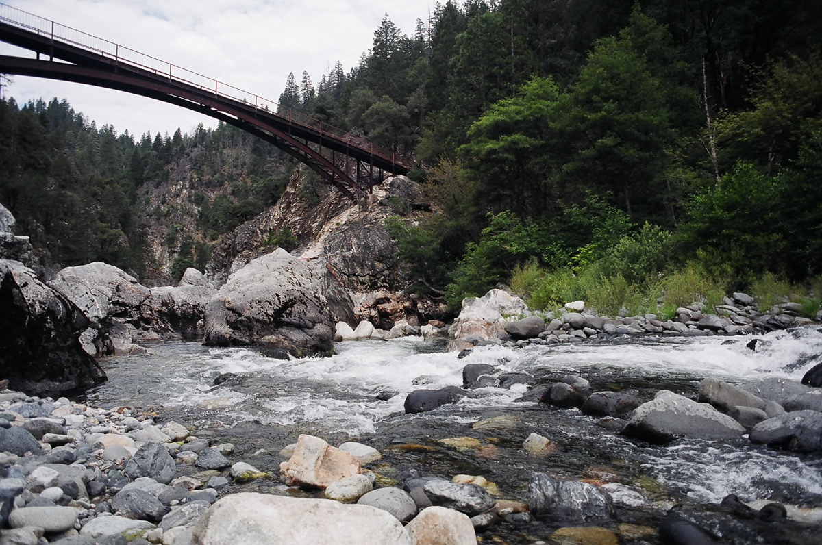 Washing up in a river.