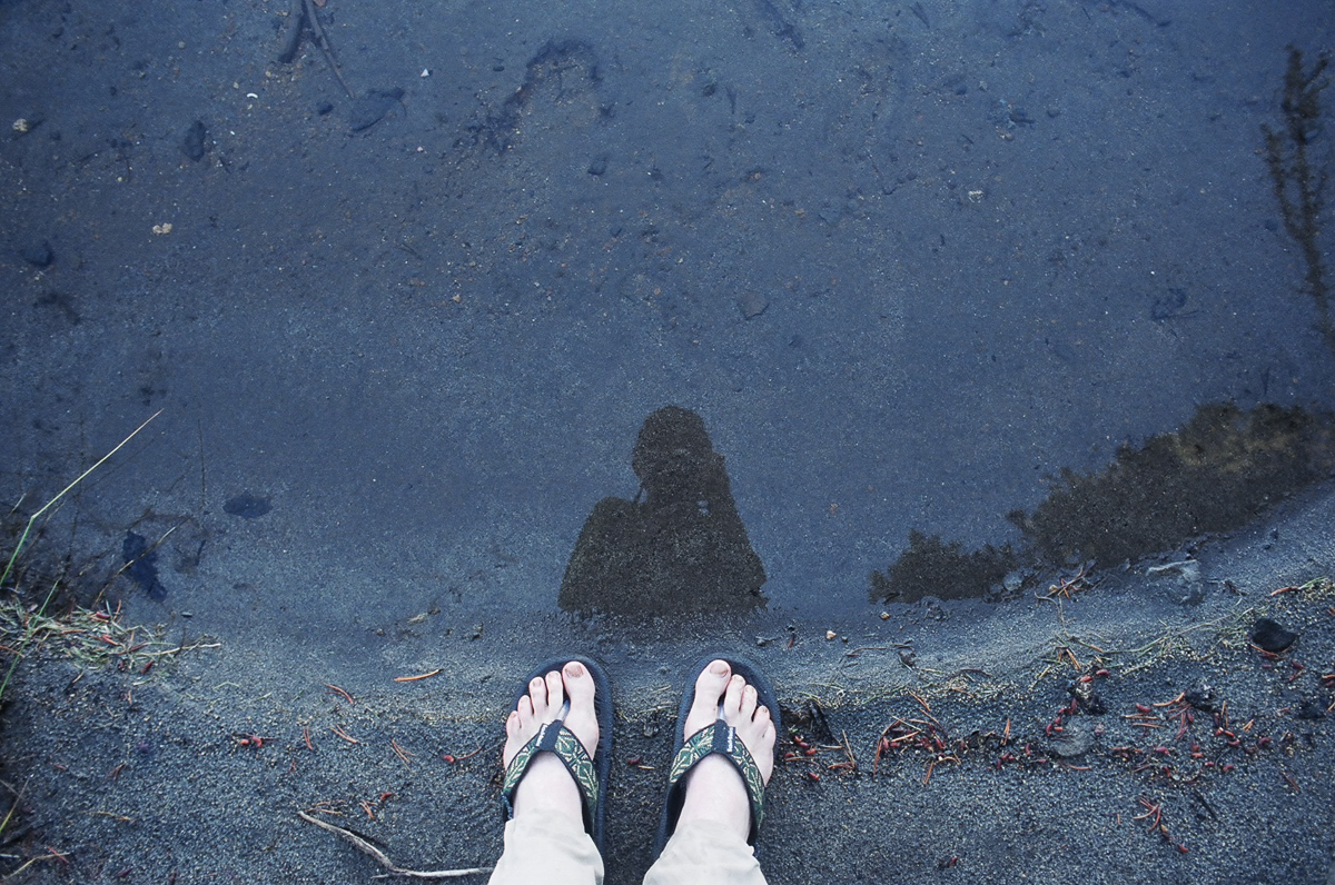 Self portrait reflected in the water.